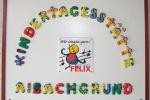 Das Logo der KiTa und die Auszeichnung des Projekts" Felix" (Wir singen gerne)